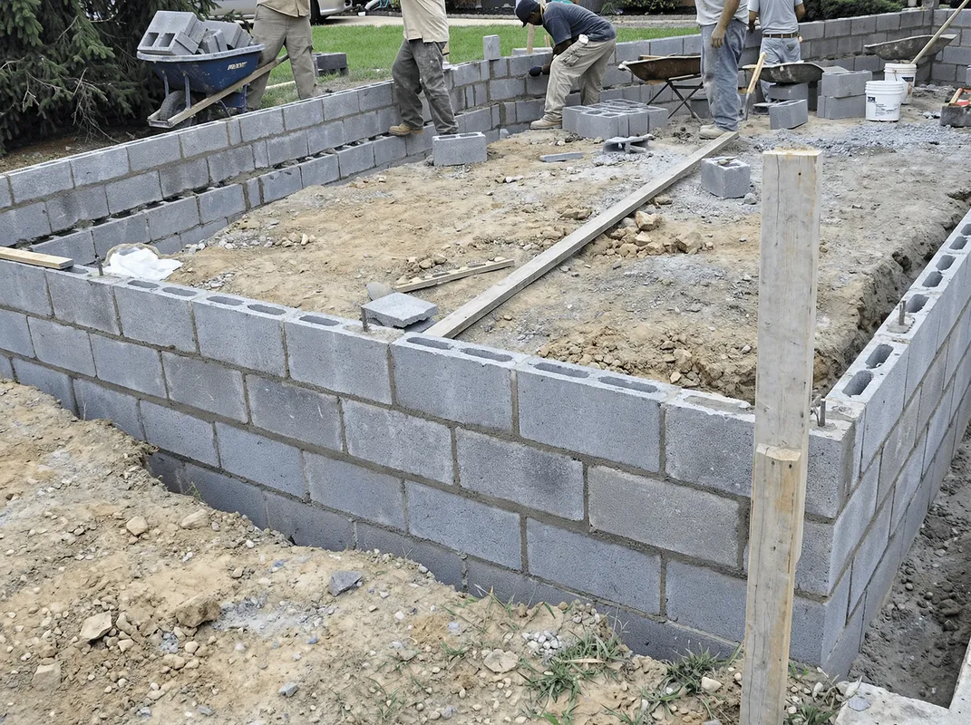 Professionals building a foundation with blocks in Boca Raton, FL